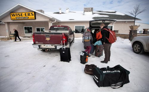 Arriving at their Pilot Mound accomodations, MTC's travelling troupe inloads before moving to neighboring Crystal City for their evening performance.  See Kevin Prokosh story. February 19, 2015 - (Phil Hossack / Winnipeg Free Press)