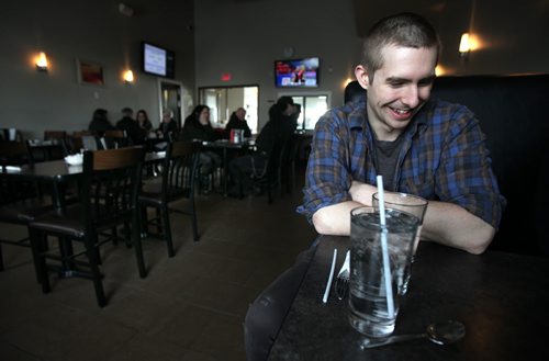 Actor Justin Oho enjoys lunch in a Pilot Mound Cafe before moving to neighboring Crystal City for their evening performance.  See Kevin Prokosh story. February 19, 2015 - (Phil Hossack / Winnipeg Free Press)