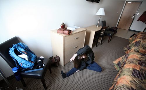Actor Heather Russell stretches during her down time at the Pilot Mound Hotel for her role in Armstrong's War at the Crystal City's Parklane Theatre Thursday evening.  See Kevin Prokosh story. February 19, 2015 - (Phil Hossack / Winnipeg Free Press)