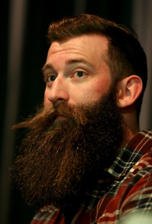 Travis Martin waits to compete in his first competition prior to the 33rd Beard Growing Contest, Friday, February 20, 2015. (TREVOR HAGAN/WINNIPEG FREE PRESS)