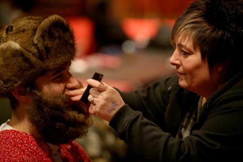 Oleksa Balko, 25, first time competitor has his beard touched up by Kerry Harrison prior to the 33rd Beard Growing Contest, Friday, February 20, 2015. (TREVOR HAGAN/WINNIPEG FREE PRESS)