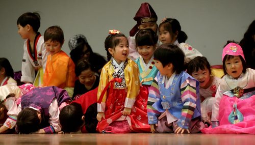 Young students from the Korean School at Grant Park, performing during Korean New Year celebrations, Saturday, February 21, 2015. (TREVOR HAGAN/WINNIPEG FREE PRESS)