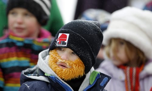 Ethan Breakey, 6, from Portage la Prairie watches a mascot challenge at the Festival du Voyageur, Saturday, February 21, 2015. (TREVOR HAGAN/WINNIPEG FREE PRESS)