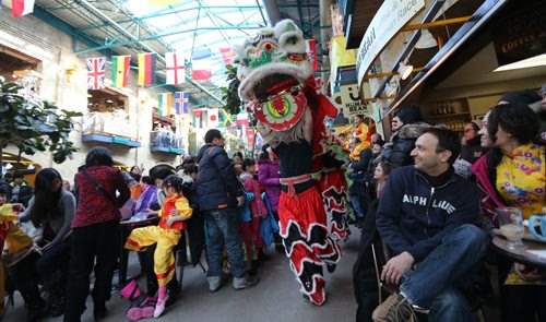 A lion dance entertains the crowd during Chinese New Year celebrations at The Forks, Saturday, February 21, 2015. (TREVOR HAGAN/WINNIPEG FREE PRESS)
