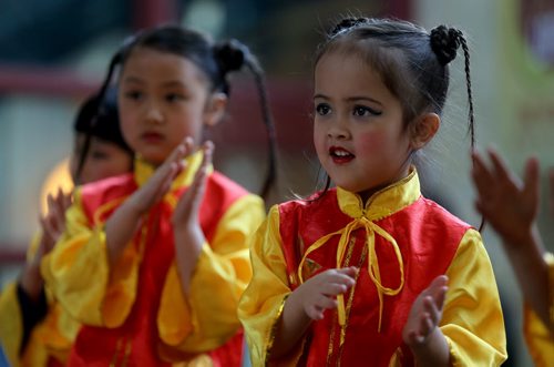 The Great Wall Dance Academy entertains the crowd during Chinese New Year celebrations at The Forks, Saturday, February 21, 2015. (TREVOR HAGAN/WINNIPEG FREE PRESS)