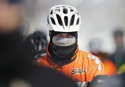 A riders prepares for the 15th annual Ice Bike event, a race on and along the Red River near The Forks, Saturday, February 21, 2015. (TREVOR HAGAN/WINNIPEG FREE PRESS)