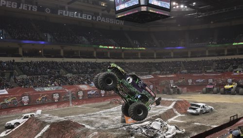DAVID LIPNOWSKI / WINNIPEG FREE PRESS (Saturday February 21, 2015)  Grave Digger piloted by Chad Tingler during Maple Leaf Monster Jam Saturday afternoon at the MTS Centre.