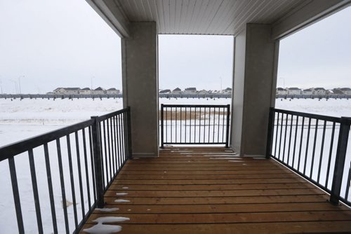 Homes.  The second floor deck off of the main floor at 240 Park West Drive in Bridgwater Lakes. Contact is Hilton Homes Spencer Curtis.  Todd Lewys story Wayne Glowacki/Winnipeg Free Press Feb.23   2015