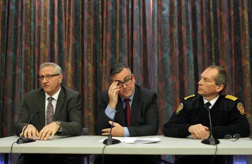 LOCAL - TRAFFIC REPORT RE FIRE HALL -  (left to right) City of Winnipeg Director of public works Brad Sacher, acting Chief Administrative Officer Michael Jack, and Fire and Paramedic Chief John Lane in the press conference on the 2nd floor conference room at the City Administration building. BORIS MINKEVICH/WINNIPEG FREE PRESS FEB. 24, 2015