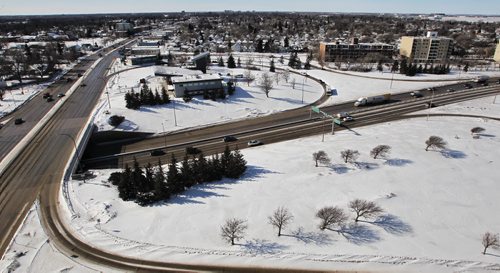 Traffic flows past Fire Hall Station #11 on the Portage overpass at Route 90 following the release of the Core Fire Hall Access Management Study (also referred to as the Station No.11 traffic study report). 150224 February 24, 2015 Mike Deal / Winnipeg Free Press