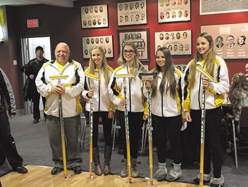Canstar Community News Feb. 17, 2015 - Elmwood Curling Club presented Team Toba with new custom brooms before they headed to Prince George, B.C., to compete in the 2015 Winter Games. From left to right, coach Albert Bazinet, lead Jessie Robertson, second Rachel Morris, third Jordyn McIntyre, and skip Shae Bevan. (SHELDON BIRNIE/CANSTAR COMMUNITY NEWS/HERALD)