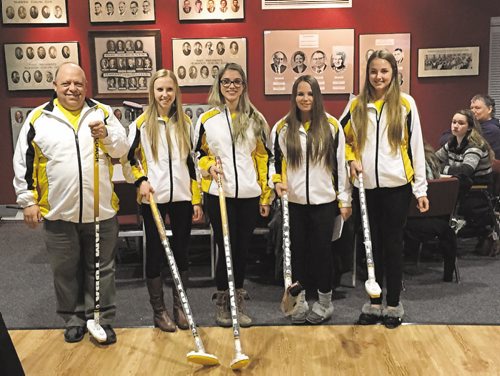Canstar Community News Feb. 17, 2015 - Elmwood Curling Club presented Team Toba with new custom brooms before they headed to Prince George, B.C., to compete in the 2015 Winter Games. From left to right, coach Albert Bazinet, lead Jessie Robertson, second Rachel Morris, third Jordyn McIntyre, and skip Shae Bevan. (SHELDON BIRNIE/CANSTAR COMMUNITY NEWS/HERALD)