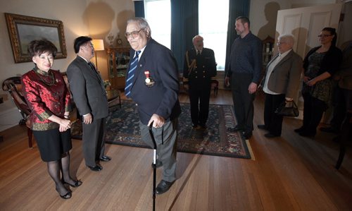 Carman's Robin Cox arrives and is greeted by Lt Governor Philip Lee and his wife (Anita?) for the  presentation of the Governonr General's "Caring Canadian Awards Ceremony Tuesday at Government House. See Release below. February 24, 2015 - (Phil Hossack / Winnipeg Free Press)   LIEUTENANT-GOVERNOR OF MANITOBA TO PRESENT GOVERNOR GENERALS CARING CANADIAN AWARD TO WORTHY MANITOBANS On behalf of His Excellency the Right Honourable David Johnson, Governor General of Canada, His Honour the Honourable Philip S. Lee, lieutenant-governor of Manitoba, will present the Governor Generals Caring Canadian Award to two worthy Manitobans, at a presentation  ceremony that will take place at Government House on Tuesday, Feb. 24 at 4 p.m. In recognizing these individuals, this award has been presented to people who have planned and served at community events, provided leadership to non-profit organizations, fed the hungry, comforted the suffering, provided joy to the heart-sick, and offered  hope to the forlorn, the lieutenant-governor said. About the Caring Canadian Award Created in 1995, the Governor Generals Caring Canadian Award recognizes living Canadians and permanent residents who have made a significant, sustained and unpaid contribution to their community, in Canada or abroad. Often working behind the scenes, these  individuals volunteer their time and efforts to help their fellow citizens. The Caring Canadian Award consists of a certificate and a lapel pin. The award symbol represents Canadians who selflessly give of their time and energy to others. The maple leaf symbolizes the people of Canada and their spirit. The heart depicts the open-heartedness  of volunteers and caregivers. The helping hand and heart support the maple leaf. The hand is outstretched to portray boundless generosity. For more information on this award, visit  www.gg.ca/caring. - more - -2- Recipients and their citations are listed below. Robin Cox Carman Robin Cox has contributed towards his commu