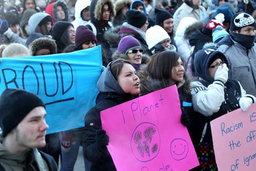 LOCAL - student march against racism Thursday, Feb 26  Brittany Young (centre, pink sign) from Yellow Quill College stands with hundreds of high school students and others rally at legislature to protest racism in Winnipeg Thursday morning.  Ruth Bonneville / Winnipeg Free Press.