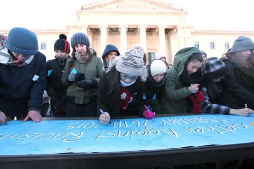 LOCAL - student march against racism Thursday, Feb. 26.  Hundreds of high school students sign their name on a large placard on a table in from of the Leg Thursday after a  rally in solidarity against racism. Ruth Bonneville / Winnipeg Free Press.