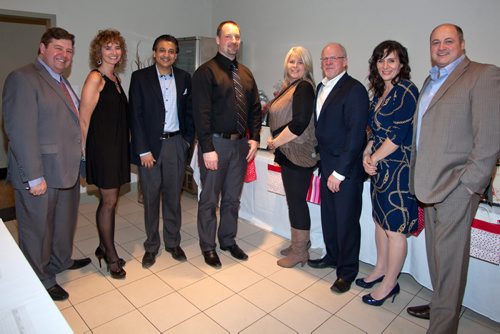 The Deer Lodge Centre Foundation held its 10th annual fundraising Bella Notte Dinner at DeLucas Banquet Centre on Feb. 13, 2015. Pictured, from left, are Gordon Fardoe, Susan Fardoe, Winston Maharaj, Paavo Ryynanen, Jacquie Lenz, Paul Challoner, Laurie Cerqueti and Tony Cerqueti. (JOHN JOHNSTON / WINNIPEG FREE PRESS)