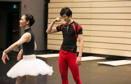 Xing laughs with soloist Sophia Lee while rehearsing the pas de deux in Swan Lake.   150220 - Friday, February 20, 2015 - (Melissa Tait / Winnipeg Free Press)