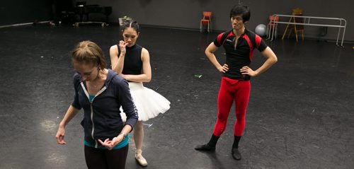 Sophia Lee and Xing watch ballet master Vanessa Leonard demonstrate during rehearsal for the pas de deux in Swan Lake. 150220 - Friday, February 20, 2015 - (Melissa Tait / Winnipeg Free Press)