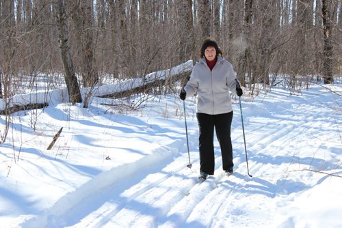025, 026 - Ruth Robertson of Dauphin out skiing on trail freshly groomed by volunteers in Riding Mountain National Park. BILL REDEKOP/WINNIPEG FREE PRESS Feb 27, 2015