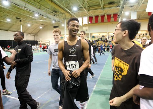 U of M Bison high jump competitor Alhaji Mansaray, celebrates breaking the western Canadian high jump record  of 2.17 metres during the  2015 Canada West Track and Field Championship the Max Bell Fieldhouse Saturday afternoon.   Saturday, Feb.28, 2015 Ruth Bonneville / Winnipeg Free Pres