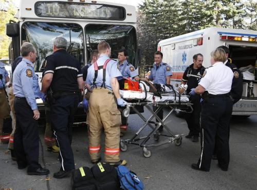 John Woods / Winnipeg Free Press / October 1/07- 071001  - Emergency tend to a cyclist who was hit by a bus at Westminster and Langside Monday October 1/07.