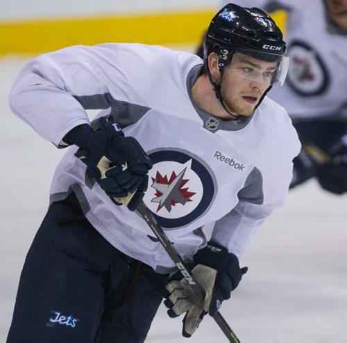 Winnipeg Jets defence Adam Lowry during practice Monday.  150302 - Monday, March 02, 2015 - (Melissa Tait / Winnipeg Free Press)