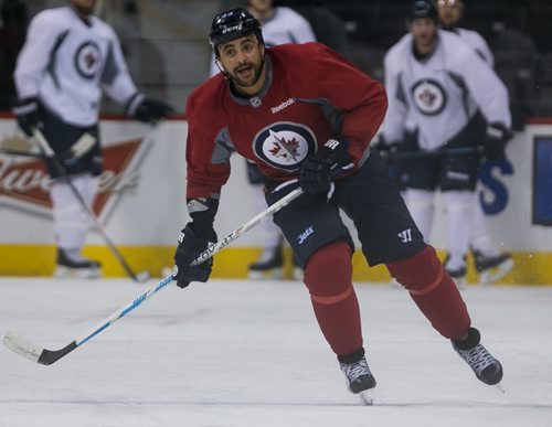 Winnipeg Jets' Dustin Byfuglien skates during practice Monday.  150302 - Monday, March 02, 2015 - (Melissa Tait / Winnipeg Free Press)