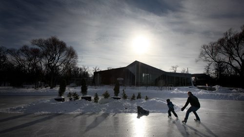 Greg Hanson enjoys an afternoon skate with his son's Erik and Leif at Assinboine Park's duck pond Monday. The trio enjoyed a warm sunny afternoon with the high near -4C. Winnipeg is expecting cloudy cooler temps tomorrow with some snow. March,2 2015 - (Phil Hossack / Winnipeg Free Press)