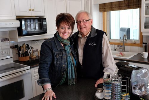 George Penner and his second wife, Peg, in their kitchen. George's first wife and two-year-old son were killed in 1980 near Gimli, MB, by their neighbour who was diagnosed with paranoid psychosis.  150302 March 02, 2015 Mike Deal / Winnipeg Free Press