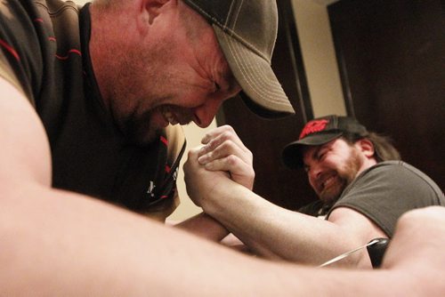 February 4, 2015 - 150204  -  Michael Barrett (R) and  Rob Low pull during a match during a Manitoba Arm Wrestling Association practise Wednesday, February 4, 2015. John Woods / Winnipeg Free Press