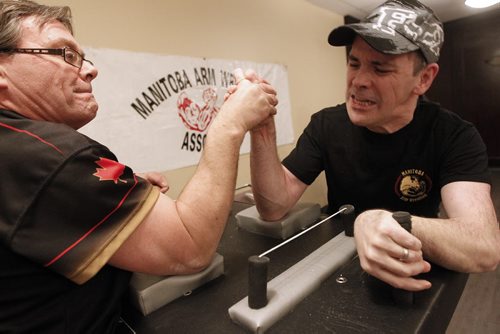 February 4, 2015 - 150204  -  Darrell Steffensen (L) and Stan Scott pull during a match at a Manitoba Arm Wrestling Association practise Wednesday, February 4, 2015. John Woods / Winnipeg Free Press