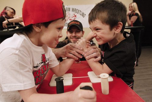 February 4, 2015 - 150204  -  Arm wrestler Jim Findley sets up Ryley Brazeau and Kayden Findley for a match at a Manitoba Arm Wrestling Association practise Wednesday, February 4, 2015. John Woods / Winnipeg Free Press
