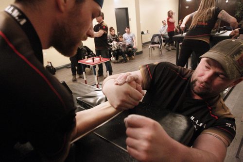 February 4, 2015 - 150204  -  Rob Low and Scott Cusitar pull during a match at a Manitoba Arm Wrestling Association practise Wednesday, February 4, 2015. John Woods / Winnipeg Free Press