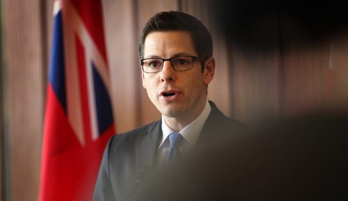 Winnipeg Mayor Brian Bowman talks to the press after unveiling the new City Budget for 2015 at City Hall Tuesday afternoon.  Tuesday,  March 03, 2015 Ruth Bonneville / Winnipeg Free Press.