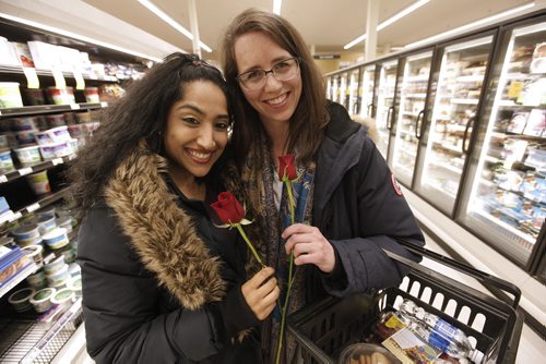 March 3, 2015 - 150303  -  Friends Priya Sharma (L) and Erica Bulow were checking out singles night at the Osborne Village Safeway Tuesday, March 3, 2015. They had given out their contact info to a couple of people. John Woods / Winnipeg Free Press