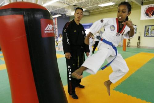 John Woods / Winnipeg Free Press / October 2/07- 071002  - Jae Park, owner of Tae Ryong Park Academy (a tae kwon do school) and 2006 World Hanmadang Champion instructs Marii Balcha (11) at the academy Tuesday, October 2/07.