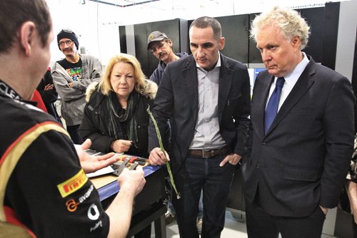 Colin Doyle (left) a Machine Instructor explains how a CMM or Computer Measuring Machin works to (l-r) Dorothy Dobbie former MP,  MLA Kevin Chief, Jean Charest former Canadian heritage minister, during a tour of the Neeginan Centre (formerly the Aboriginal Centre of Winnipeg).  150304 March 04, 2015 Mike Deal / Winnipeg Free Press