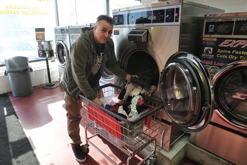 Elder De Andrade in his laundromat, The Washeteria, at 556 Keenleyside Street. 150304 March 04, 2015 Mike Deal / Winnipeg Free Press