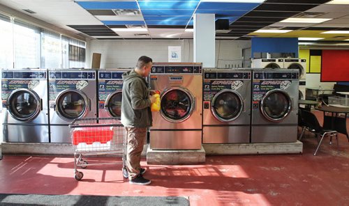 Elder De Andrade in his laundromat, The Washeteria, at 556 Keenleyside Street. 150304 March 04, 2015 Mike Deal / Winnipeg Free Press