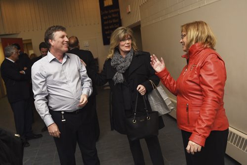DAVID LIPNOWSKI / WINNIPEG FREE PRESS  Executive Director of Siloam Mission Floyd Perras, The Honourable Shelly Glover, and CEO of Macdonald Youth Services Erma Chapman mingle prior to a downtown Winnipeg biz funding announcement at Union Gospel Mission Thursday morning.