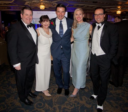 The fifth annual Savour: Wine and Food Experience was held at the Metropolitan Entertainment Centre on Feb. 28, 2015. The theme was old Hollywood, and the event was hosted by actor Billy Baldwin. Funds from the event support research, education, advanced technology and infrastructure enhancements at Health Sciences Centre. Pictured, from left, are Jonathon Lyon, Bonnie Staples-Lyon, Billy Baldwin, Colleen McFadden and Kevin McFadden. (JOHN JOHNSTON / WINNIPEG FREE PRESS)