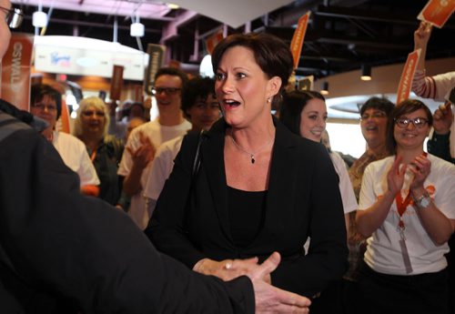 NDP candidate Theresa Oswald is greeted by supporters at Canad Inns Friday afternoon where  NDP convention is being held this weekend to select a leader. Friday,  March 06, 2015 Ruth Bonneville / Winnipeg Free Press.