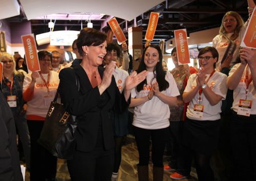 NDP candidate Theresa Oswald is greeted by supporters at Canad Inns Friday afternoon where  NDP convention is being held this weekend to select a leader. Friday,  March 06, 2015 Ruth Bonneville / Winnipeg Free Press.