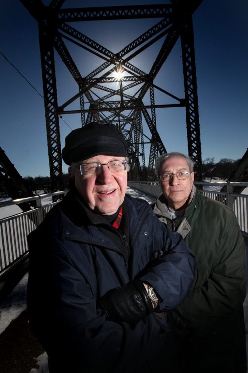 Ken Murdoch and Ken Kuhn (left) pose on a Winnipeg Bridge (BDI) Friday. The pair took part in Martin Luther King marches, Murdoch on the Selma Bridge and Kuhn walked into Birmingham with King a few days later. (He didn't march across the Selma Bridge).  See Dave Sanderson story. March 6, 2015 - (Phil Hossack / Winnipeg Free Press)