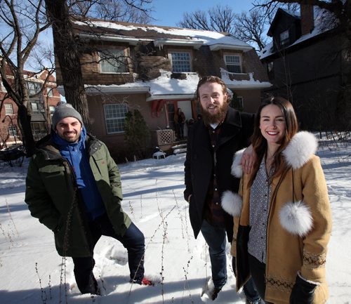Left to right, architectural intern Andre Silva, and young condo-coop project couple Taylor Archibald and Whitney Atkinson outside a Wellington Cresc. teardown house on 5,000 square foot lot that will be transformed into a condo-coop-style seven-unit building with underground parking. See Gord Sinclair's story. March 6, 2015 - (Phil Hossack / Winnipeg Free Press)