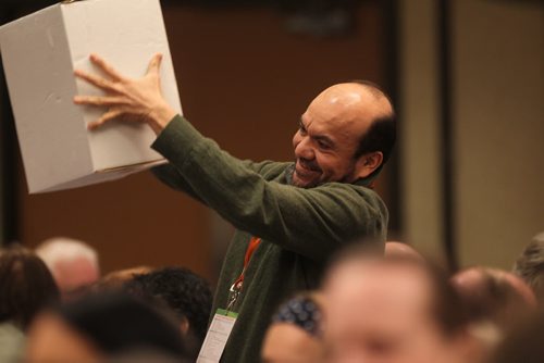 Felix Meza, a usher at the NDP Convention holds a ballet box for NDP members to cast their vote for a new president at the Convention Saturday held at Canad Inns. Saturday,  March 07, 2015 Ruth Bonneville / Winnipeg Free Press.