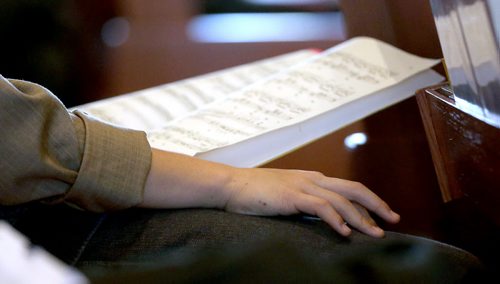 A performer practices in his lap during the Winnipeg Music Festival at St.Mary's Road United Church, Saturday, March 7, 2015. (TREVOR HAGAN/WINNIPEG FREE PRESS)
