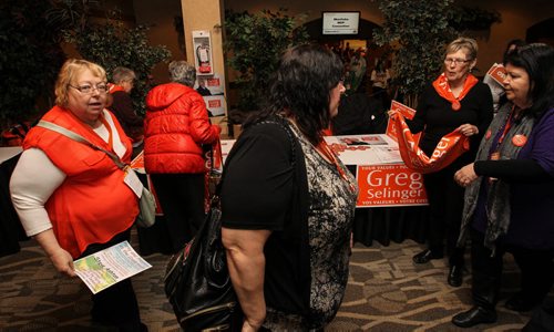 Delegates arrive for the start of the last day of the NDP Convention sunday morning at Canad Inns Polo Park. 150308 - Sunday, March 08, 2015 -  (MIKE DEAL / WINNIPEG FREE PRESS)