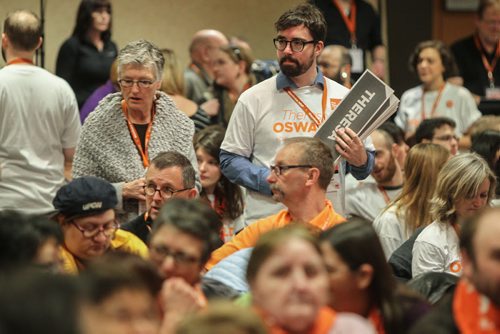 Delegates look for seats sunday morning at the start of the last day of the NDP Convention at Canad Inns Polo Park. 150308 - Sunday, March 08, 2015 -  (MIKE DEAL / WINNIPEG FREE PRESS)