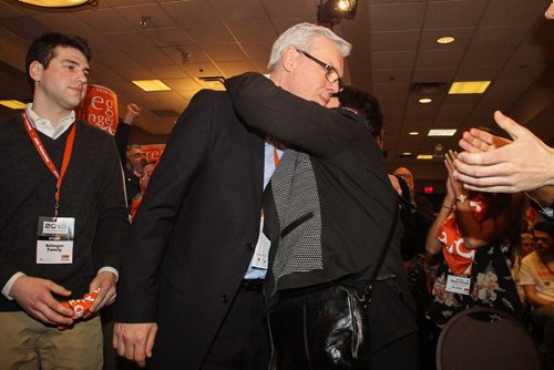 Greg Selinger is hugged by his wife Claudette Toupin after winning enough votes during his re-election as the leader of the provincial NDP on sunday at the NDP Convention at Canad Inns Polo Park. 150308 - Sunday, March 08, 2015 -  (MIKE DEAL / WINNIPEG FREE PRESS)